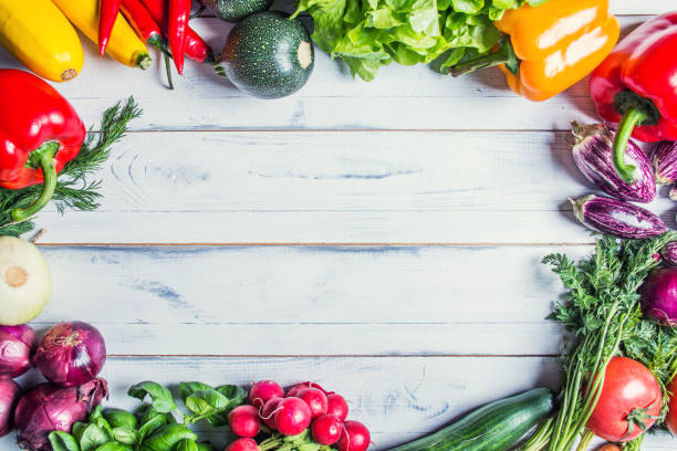 istock Fresh vegetable melange on wooden rustic background. 943096014