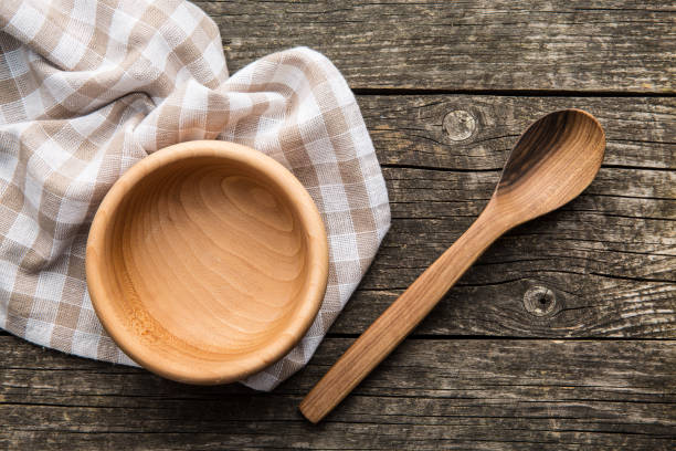 istock Wooden spoon and bowl 943096058