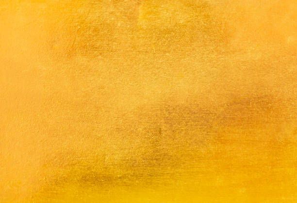 istock Shiny yellow leaf gold foil texture 943101212