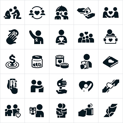 An icon set of charitable giving themes. The icons include donations of money, a helping hand, food donations, awareness ribbon, donation jar, online donating, giving gifts, a hug and an arm around shoulder to name a few.