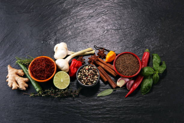 istock Spices and herbs on table. Food and cuisine ingredients. 943115624