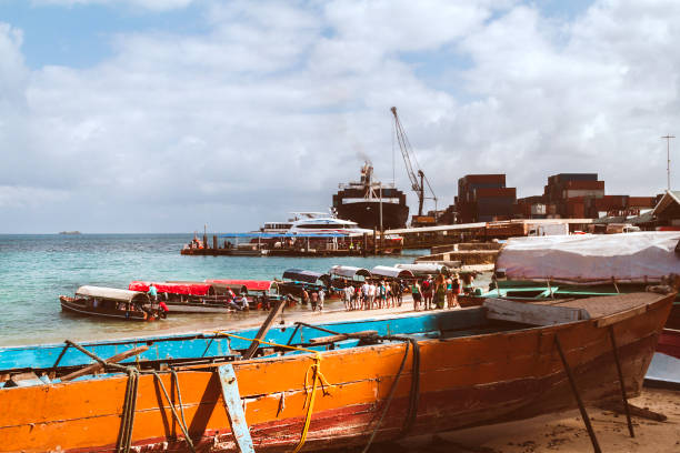 istock Tourists board boats at Zanzibar 943123004