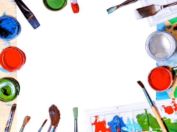 istock Color gouache jars on white background. Top view, copy space 943126604