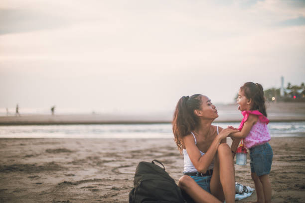 istock Family playing on the beach 943147588