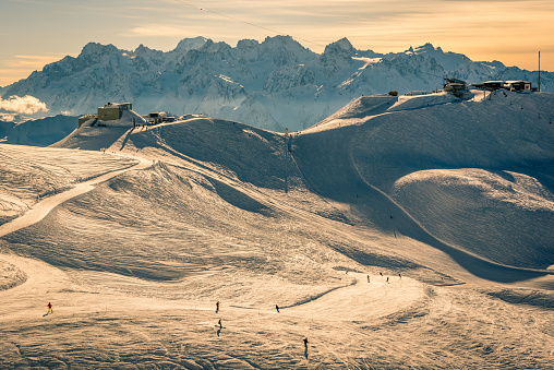 Sunset on the pistes in the famous Swiss ski resort of Verbier, the empty pistes are bathed in beautiful evening light.