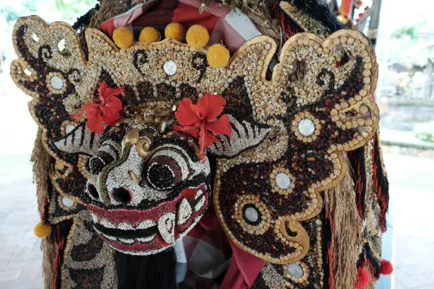 A statue of Barong, king of the spirits in Balinese mythology, created with beans.