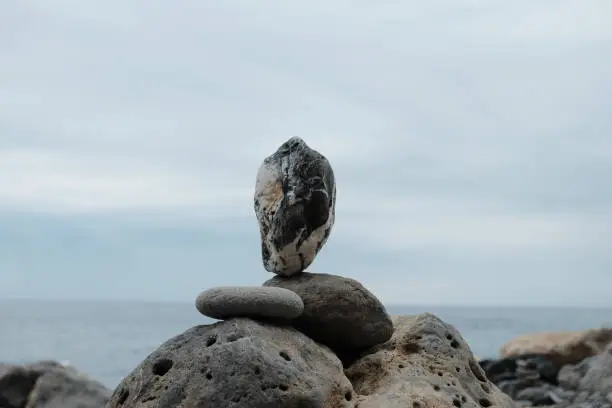 Zen stone on the beach in Cinque Terre, Italy.