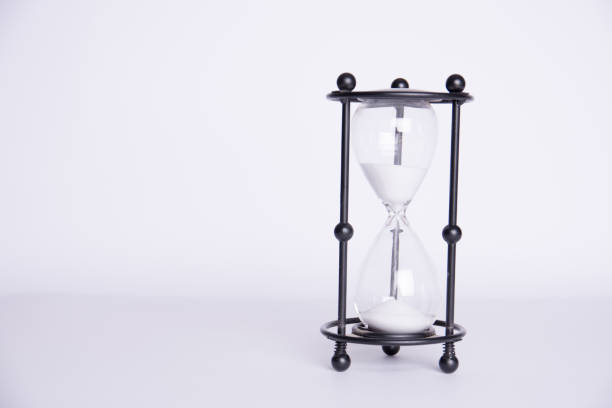 istock an image of hourglass on a white background 943182046