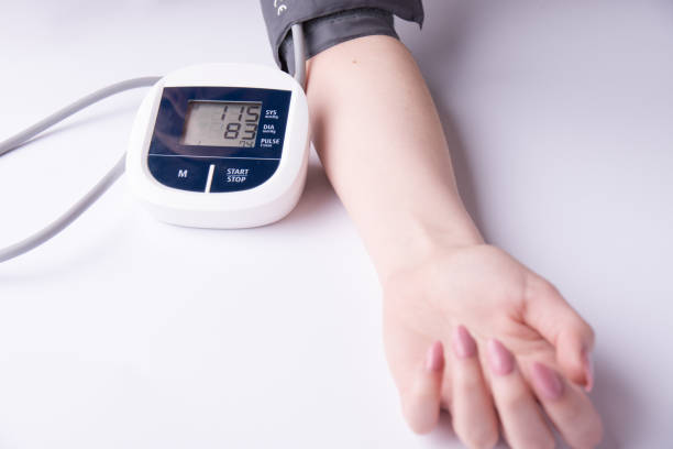 istock measuring blood pressure on a white background 943185524