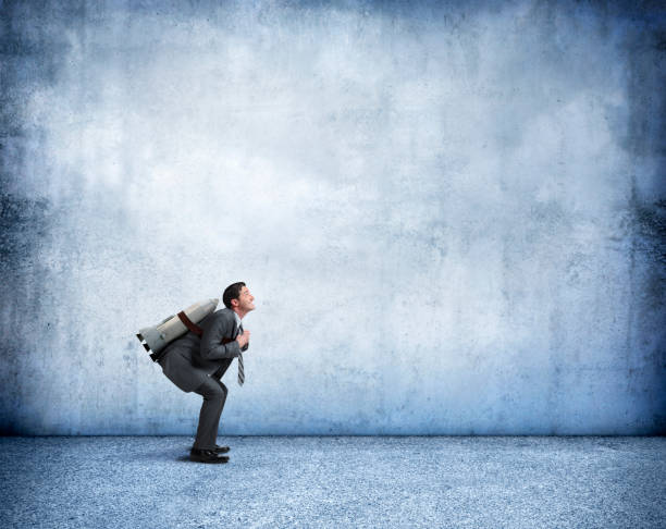 istock Businessman With Rocket Strapped To His Back 943191890