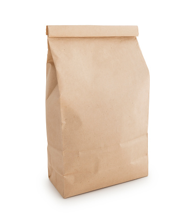 Brown paper coffee bag isolated on white (excluding the shadow)