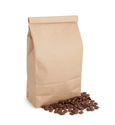 Brown paper coffee bag and beans isolated on white (excluding the shadow)