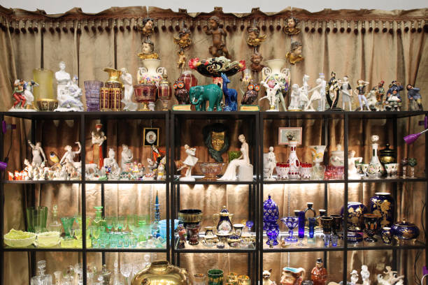 istock Beautiful exposition of ancient figurines, tableware and various vases 943198558