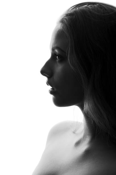 istock Profile Of Beautiful Young Woman 943204356
