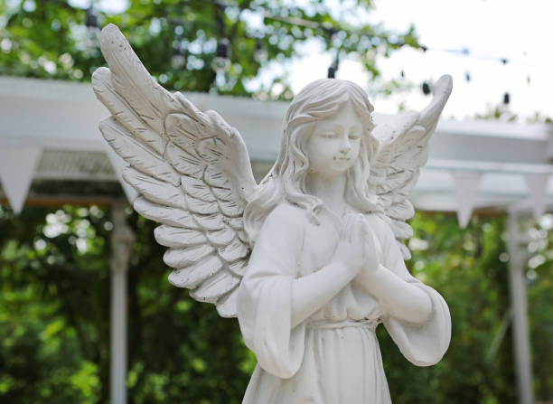 istock an angel in the garden. 943207518