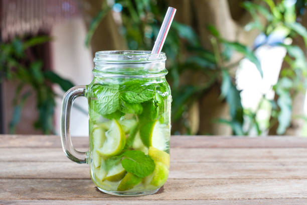 Lemon fruit Caipirinha alcoholic beverage of Brazil on wooden table