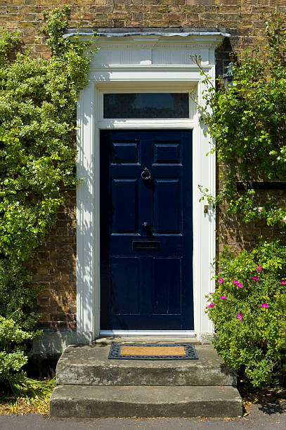 istock Blue door with welcome mat 94321581