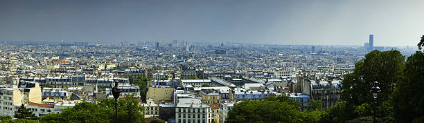 Paris, France. Amazing landscape to the city from the hill of Sacré-Coeur. Summer time. view of the buildings and the roof of Paris