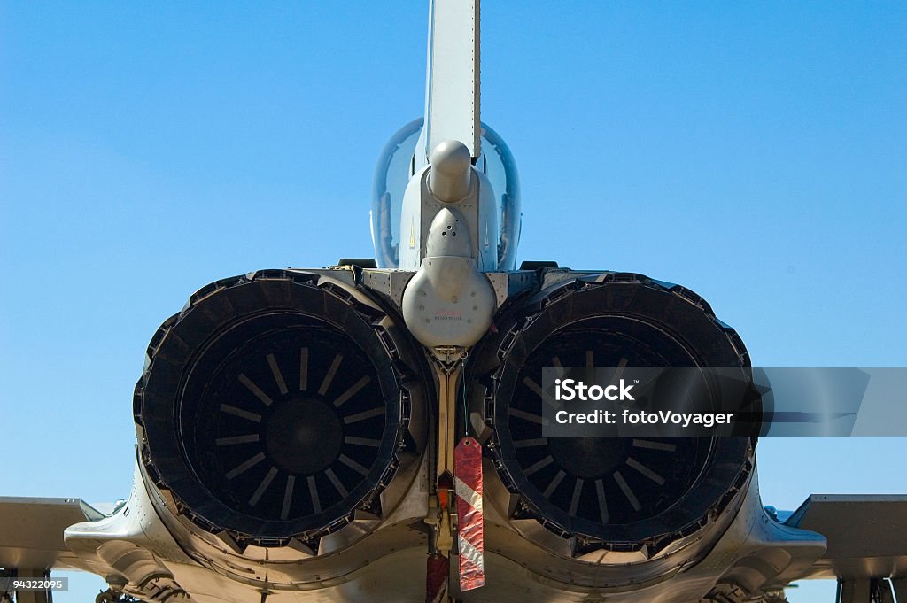 Afterburner jet engines Exhaust nozzles and afterburners of a twin engined military fighter plane. Adobe RGB 1998 color profile. Airplane Stock Photo