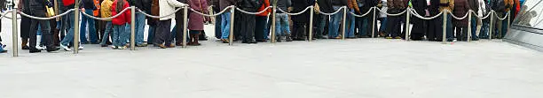 Photo of People standing in line