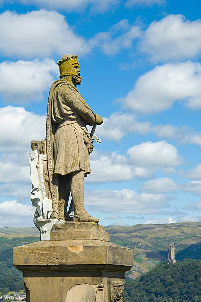 istock Robert the Bruce statue and Wallace Monument, Scotland 94323466