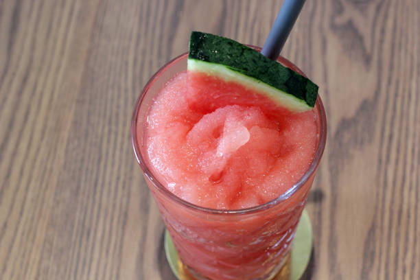 istock sweet watermelon juice on wooden table 943234986