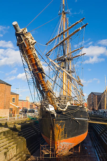 istock Wooden sailing ship being repaired 94323636