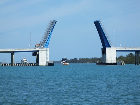 Drawbridge opening for boats to pass.