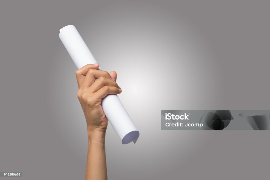 Close Up Of Hand Holding Paper Roll Isolated On White Background Stock  Photo - Download Image Now - iStock