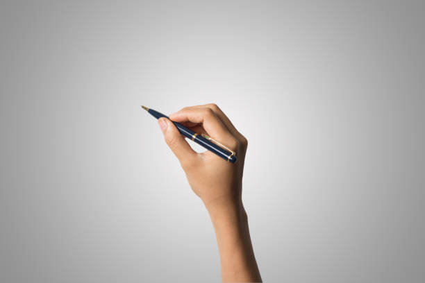 istock Woman hand with pens isolated on white background. 943250672
