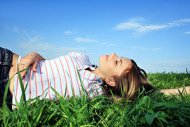istock Relaxing girl on meadow 94325255