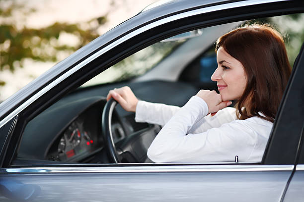 istock Pretty girl in car 94325373