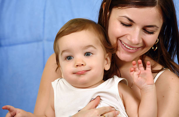 istock Happy mother with baby 94325470