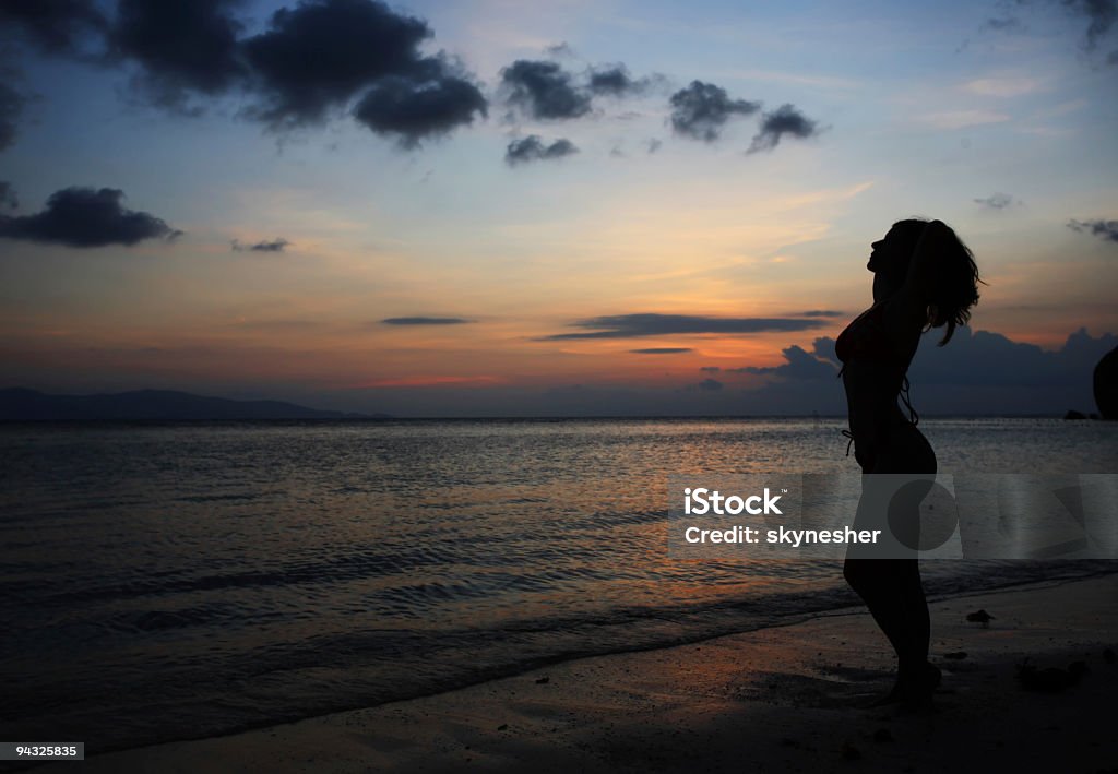 Silhouette of a woman  Adult Stock Photo