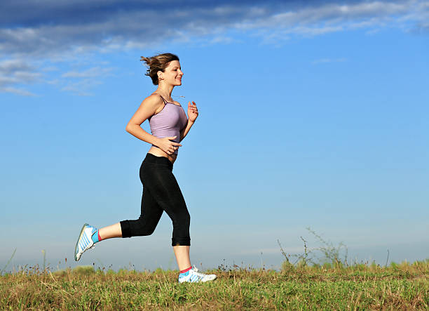 istock Young woman running outdoor. 94326020