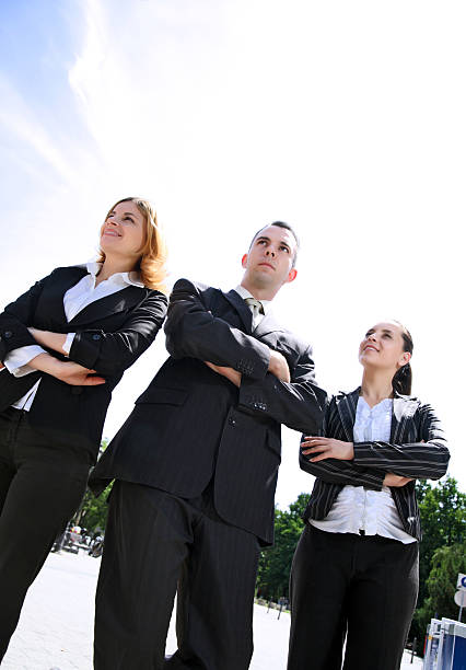 istock Businesspeople standing together in line. 94326623