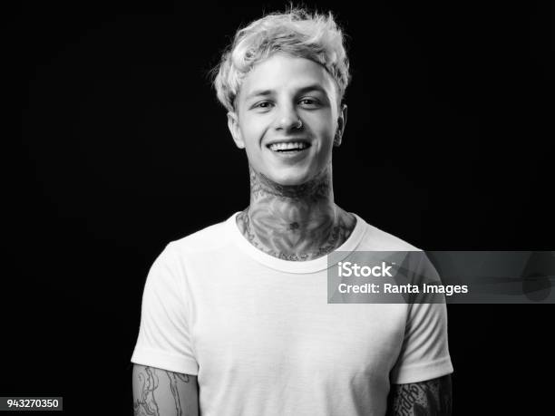 Portrait Of Tattooed Young Man Stock Photo - Download Image Now - Black And White, Men, Portrait