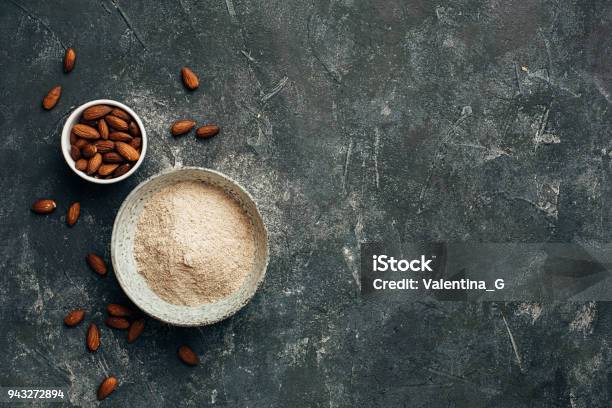 Bowl Of Almond Flour And Bowl Of Almonds From Top View Copy Space Stock Photo - Download Image Now