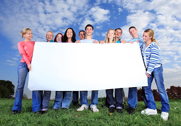 istock Big group of people holding placard. 94327342