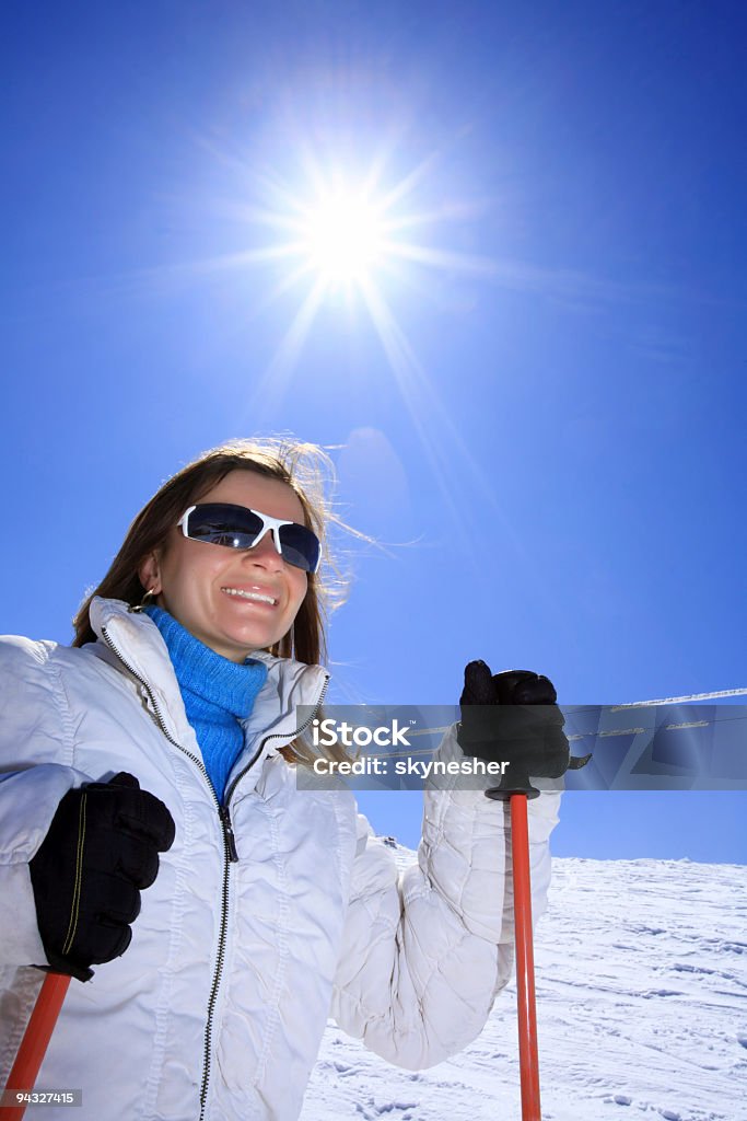 Girl with ski on the mountain.  Ski Stock Photo