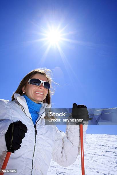 Girl With Ski On The Mountain Stock Photo - Download Image Now - Ski, Skiing, Women