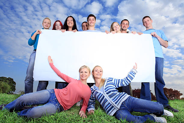 istock Big group of people holding placard. 94328460