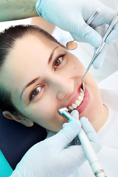 istock Woman patient at the dentist. 94328775