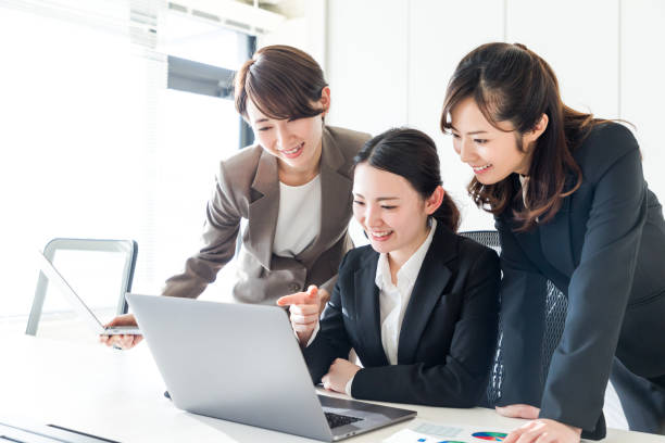 Group of businesswoman working in office. Group of businesswoman working in office. affirmative action photos stock pictures, royalty-free photos & images