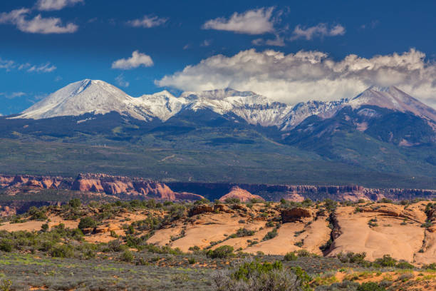 istock Scenery in the Arches National Park, Utah, with Mesa Arch under warm sunrise light 943288842