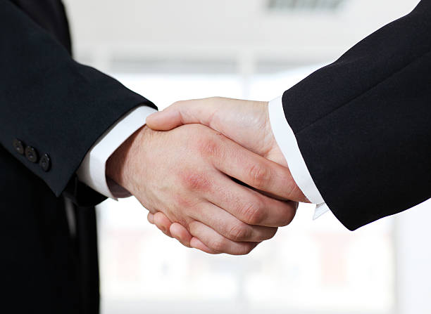 istock Close-up of a shaking hands. 94328887