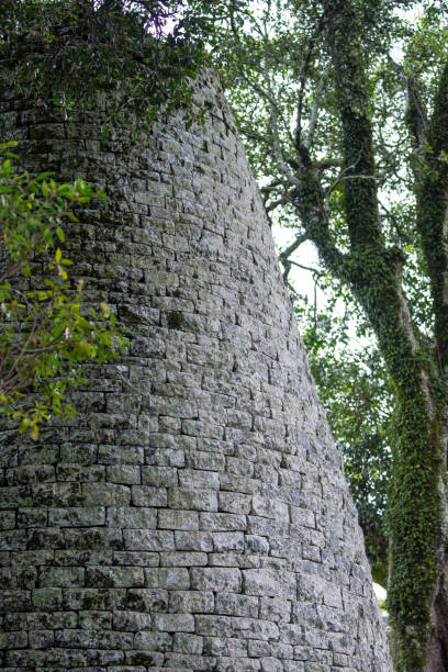 The iconic tower within the Great Enclosure of the Great Zimbabwe National Monument. The site is one of the most important archeological sites in Africa and is a UNESCO World Heritage Site.