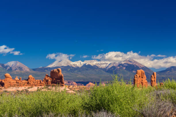 istock Scenery in the Arches National Park, Utah, with Mesa Arch under warm sunrise light 943289720