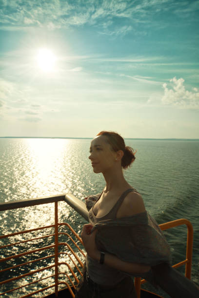 istock young beautiful woman on the cruise ship deck 943290146