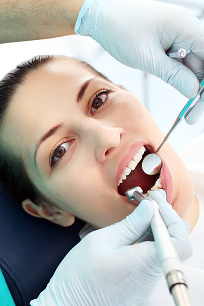 istock Woman patient at the dentist. 94329030